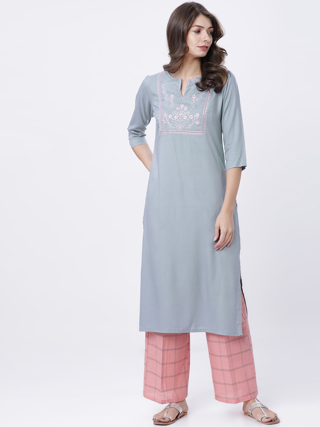 

Vishudh Women Coral Embroidered Kurta with Palazzos