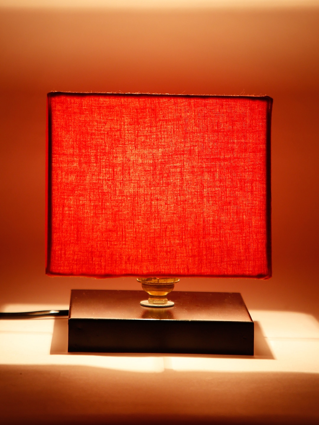 

Devansh Orange Solid Contemporary Square Table Lamp