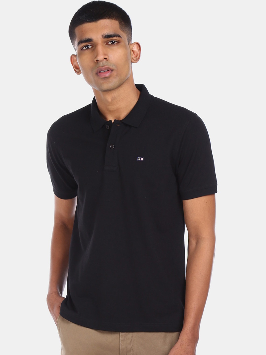 

Arrow Sport Men Black Solid Polo Collar T-shirt