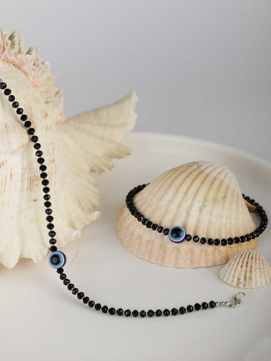 

Priyaasi Set Of 2 Silver-Plated Black & Blue Beaded Handcrafted Anklets