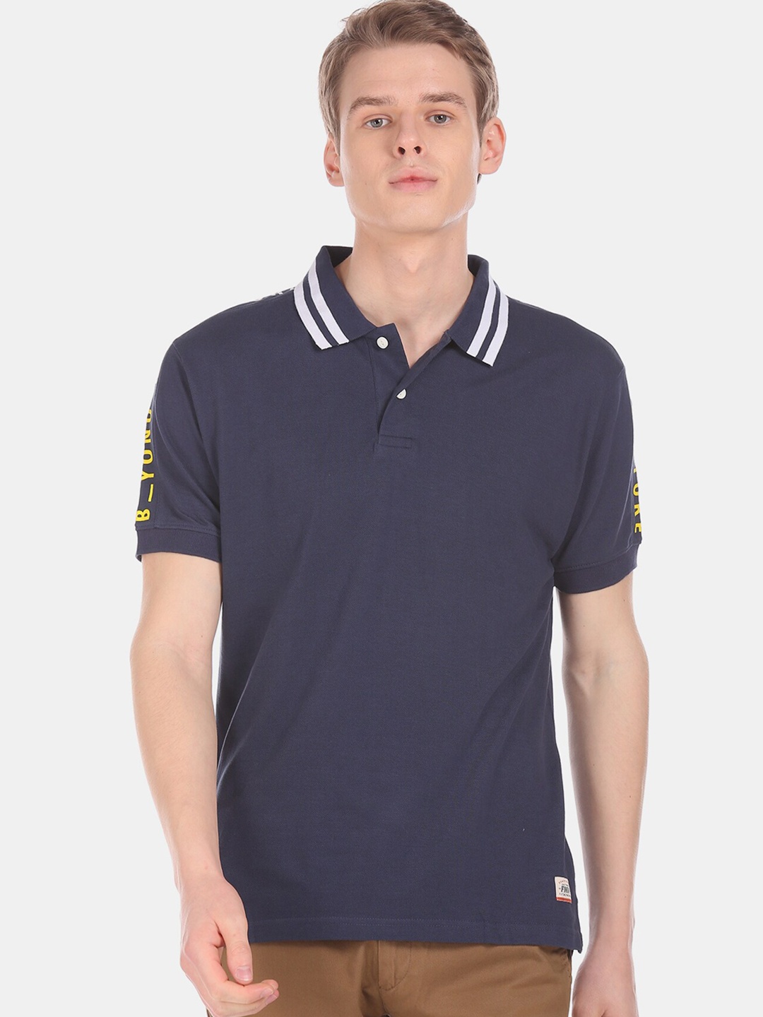 

Flying Machine Men Navy Blue Solid Polo Collar Cotton Pure Cotton T-shirt