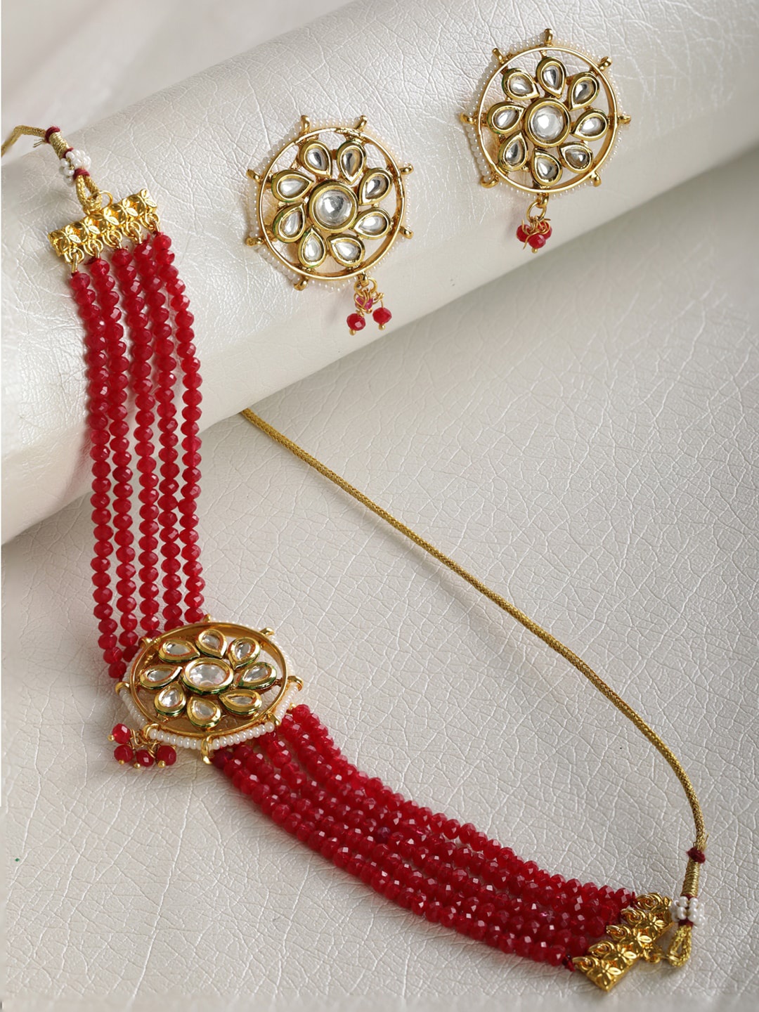 

Priyaasi Gold-Plated Red & White Kundan Studded Beaded Choker Jewellery Set