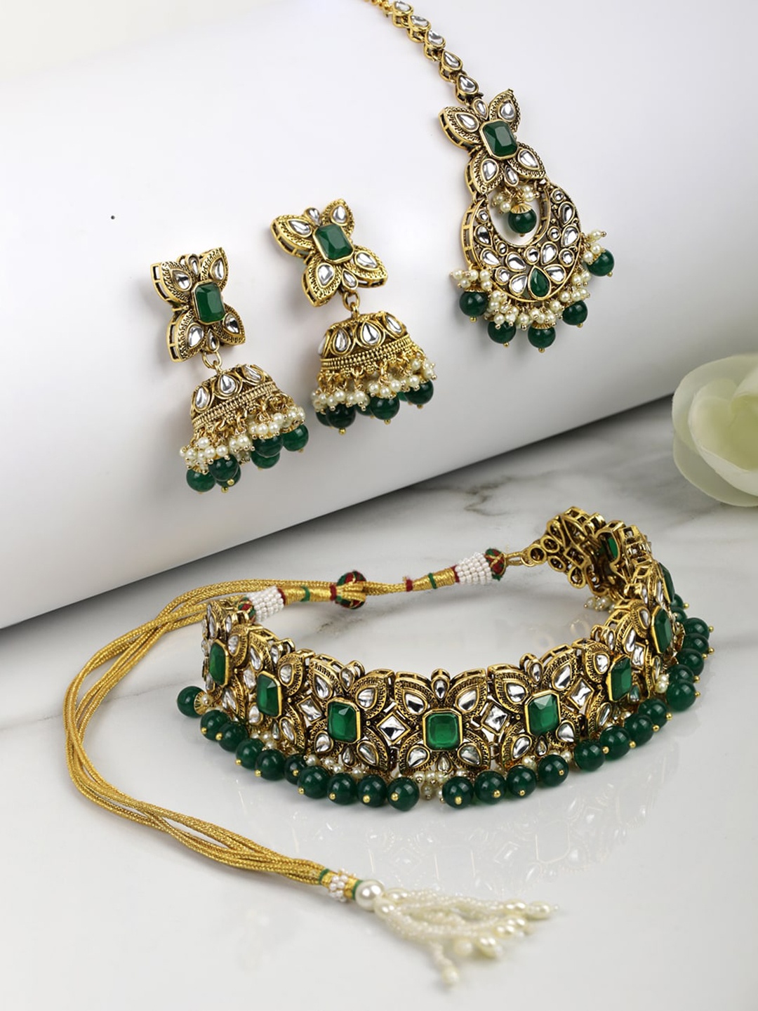 

Priyaasi Gold-Plated Green & Off-White Kundan Studded Jewellery Set