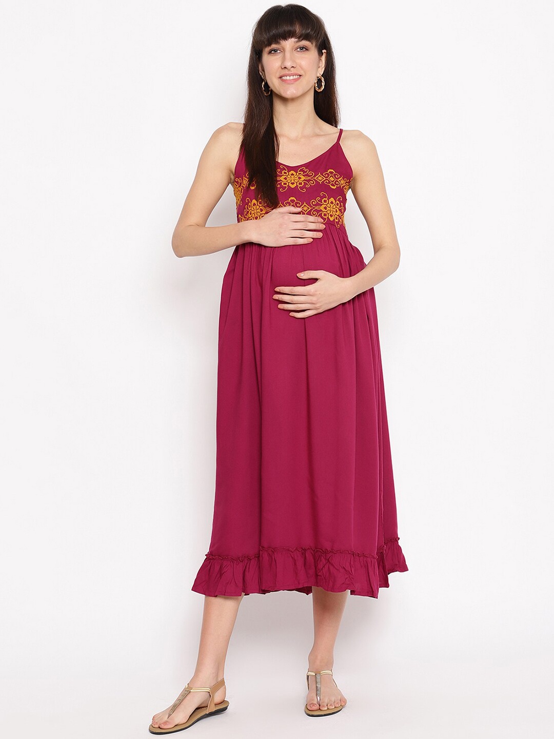 

The Vanca Women Red Solid Empire Maternity Dress