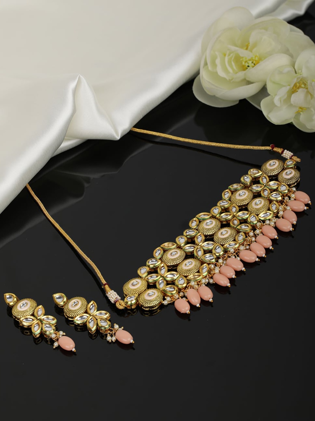 

Priyaasi Gold-Plated Peach Coloured Kundan Studded Handcrafted Jewellery Set