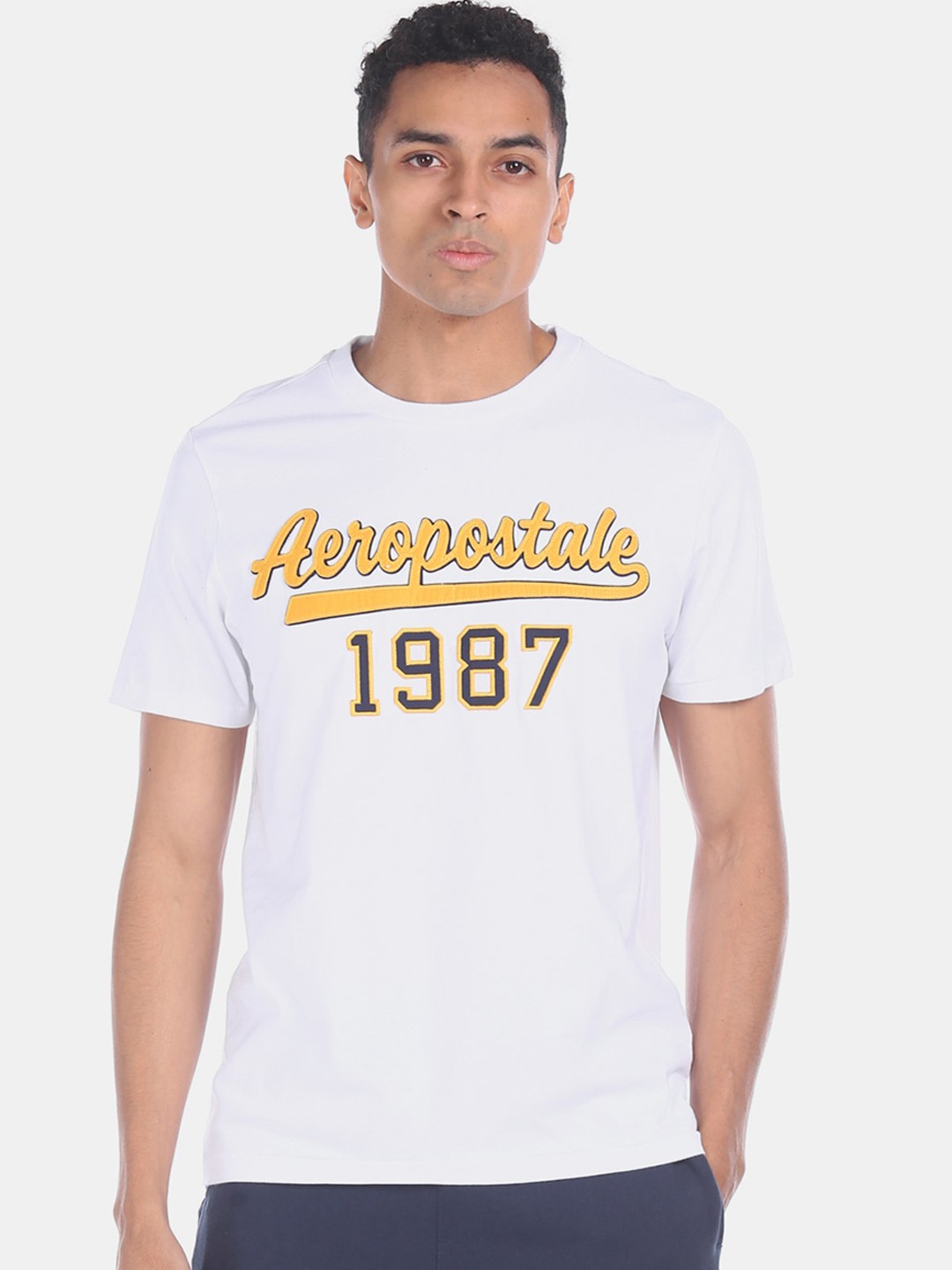 

Aeropostale Men White Yellow Printed Round Neck Cotton Pure Cotton T-shirt