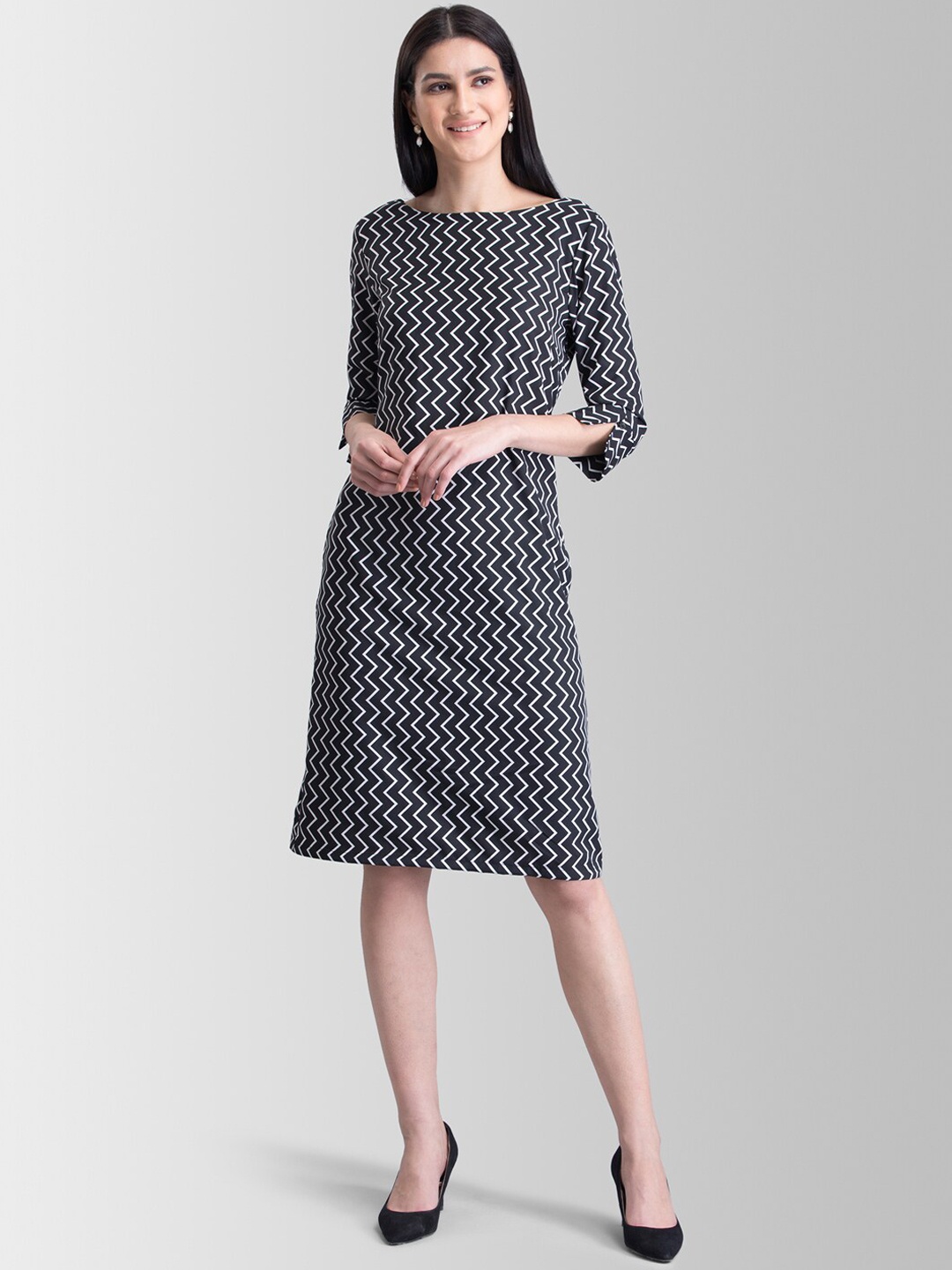 

FableStreet Women Black Printed Sheath Dress