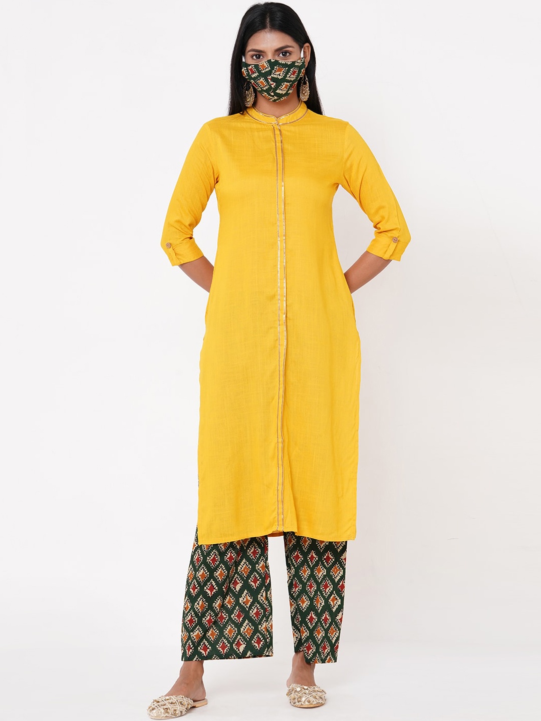

FASHOR Women Yellow Solid Kurta with Palazzos