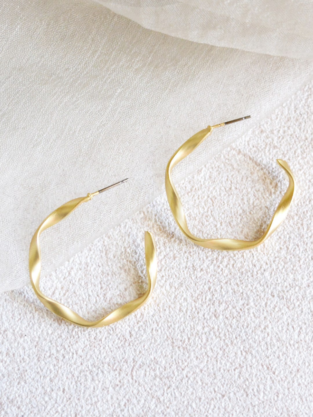 

JOKER & WITCH Gold-Plated Contemporary Twisted Half Hoop Earrings