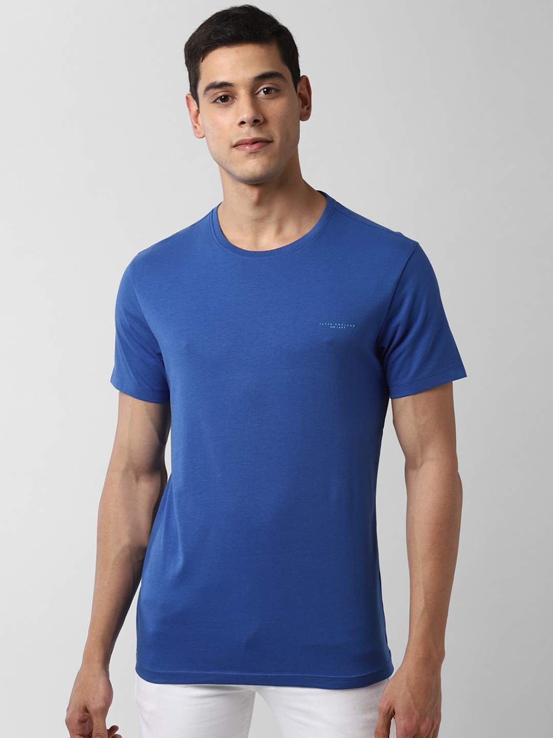 

Peter England Casuals Men Blue Solid Round Neck T-shirt