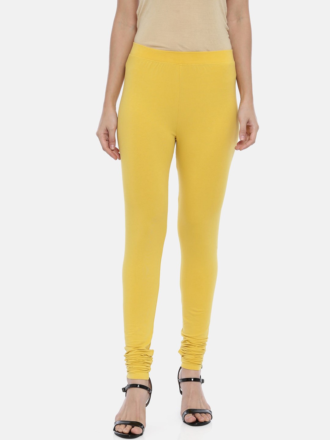 

Huggy Women Yellow Solid Churidhar-Length Leggings