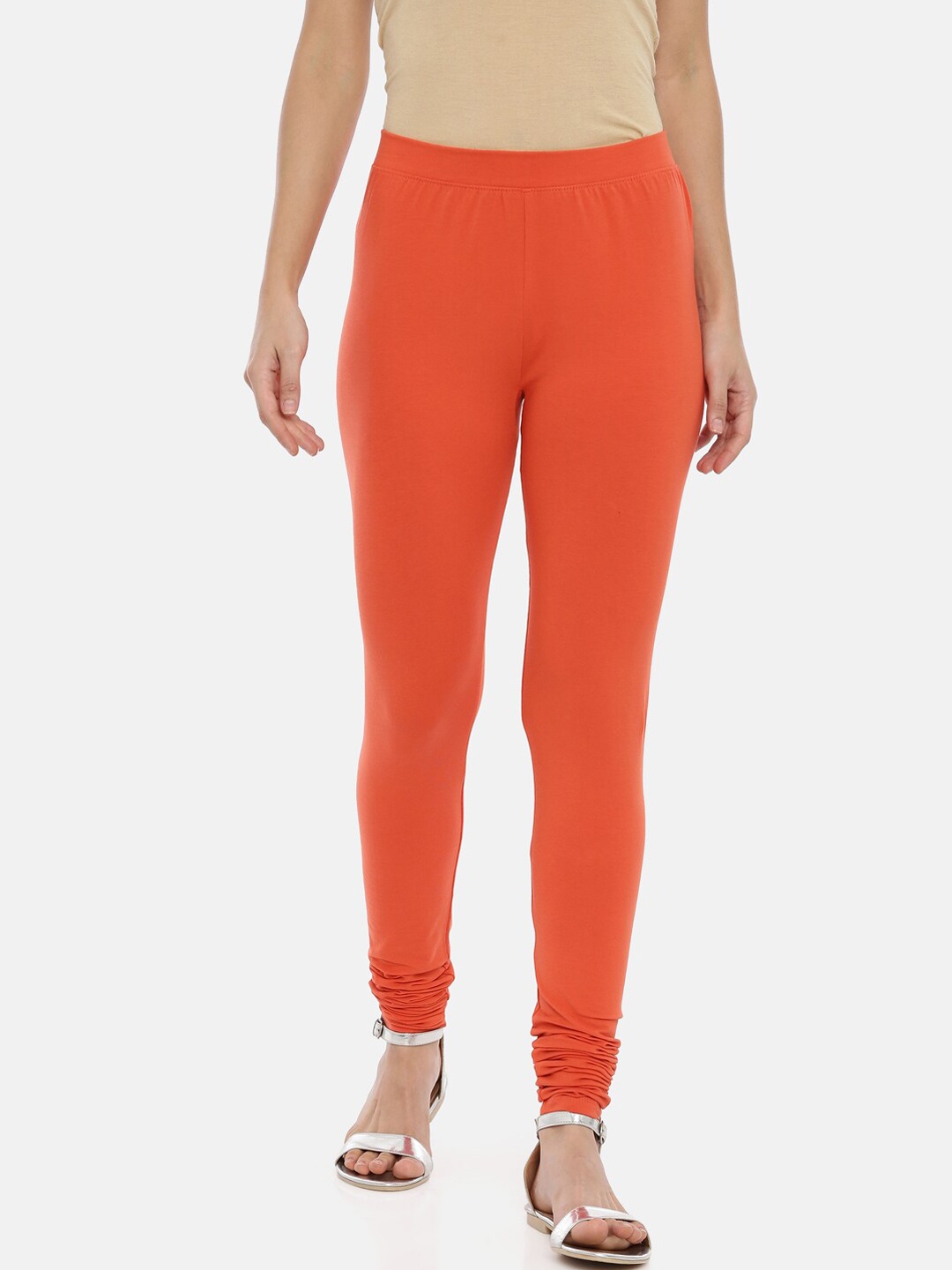 

Huggy Women Orange Solid Churidar-Length Leggings