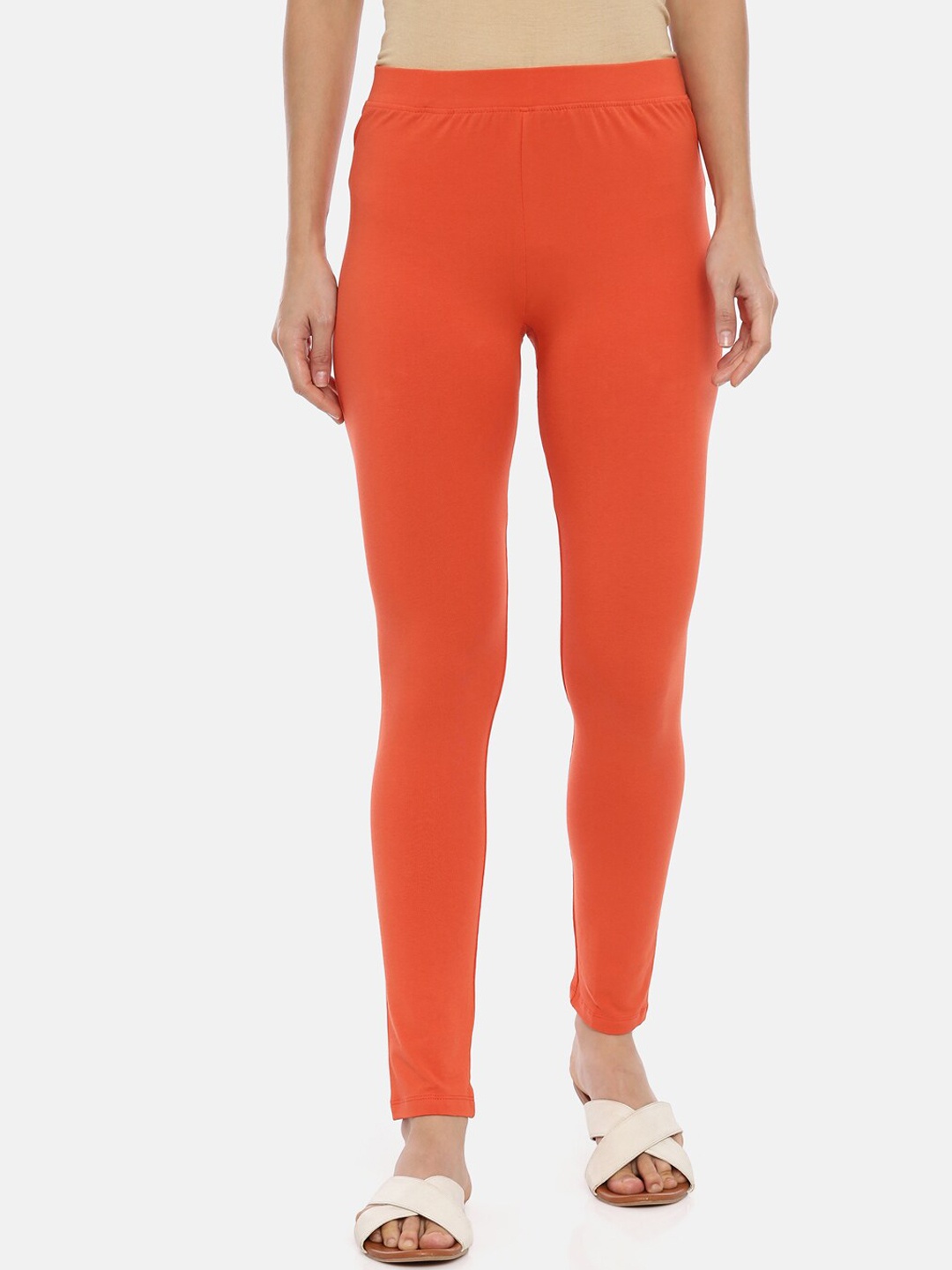 

Huggy Women Orange Solid Ankle Length Leggings