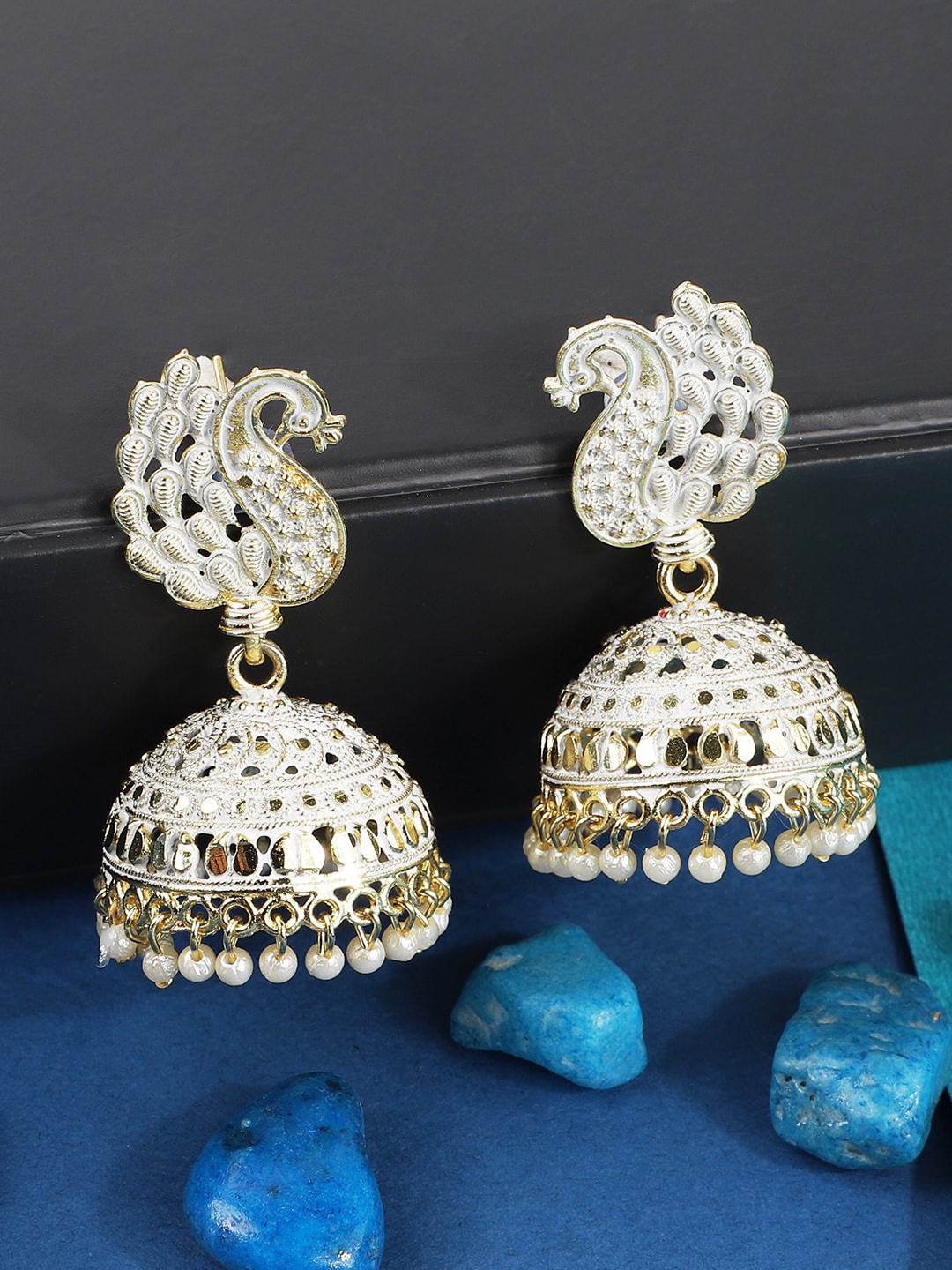

ANIKAS CREATION Gold-Plated White Enamelled Peacock Shaped Lightweight Jhumkas