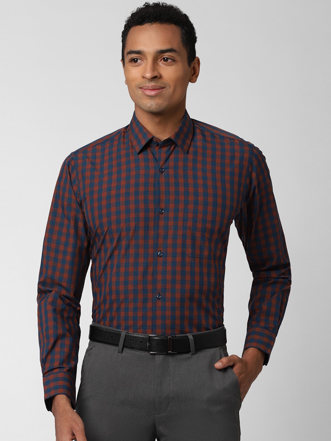 

Peter England Men Blue Regular Fit Checked Casual Shirt