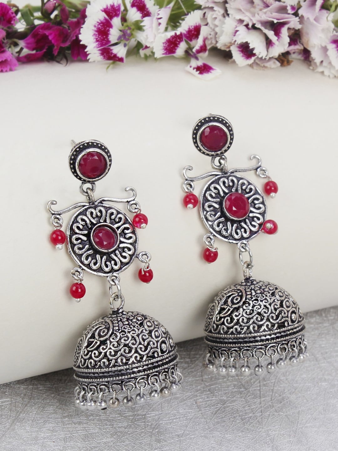 

Crunchy Fashion Maroon Silver-Plated Dome Shaped Jhumkas