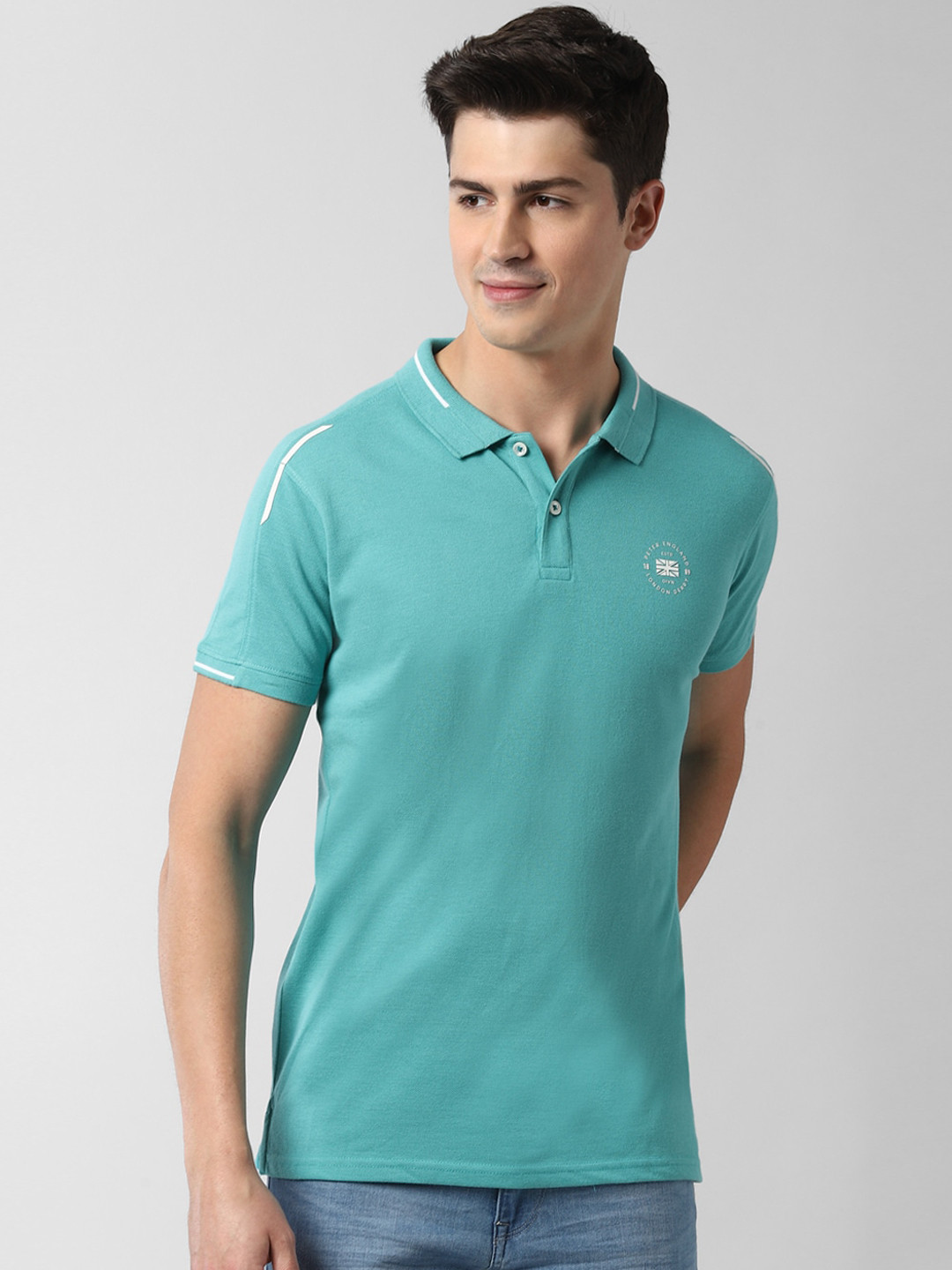 

Peter England Casuals Men Blue Solid Polo Collar T-shirt