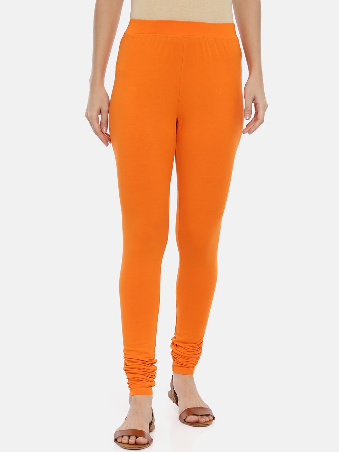 

Huggy Women Orange Solid Churidar-Length Leggings