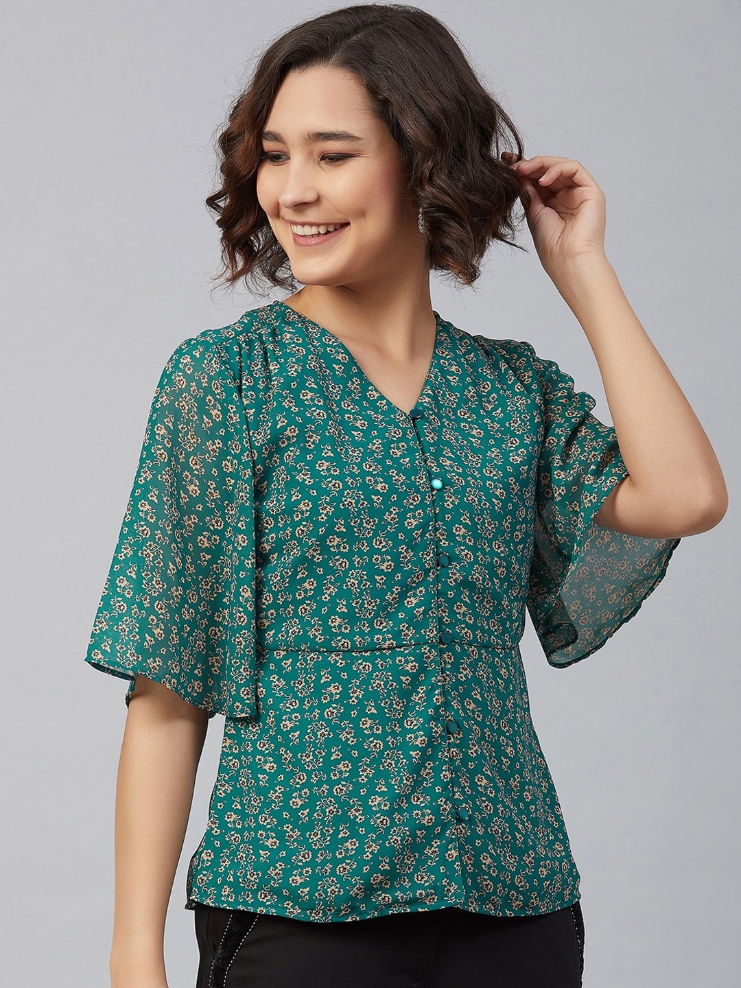 

Carlton London Green Floral Printed Flutter Sleeves Georgette Regular Top