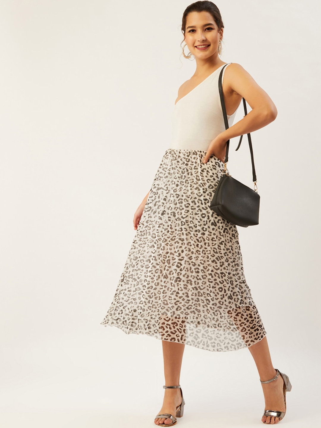 

ANVI Be Yourself Women Off-White & Black Animal Printed Pleated A-Line Midi Skirt