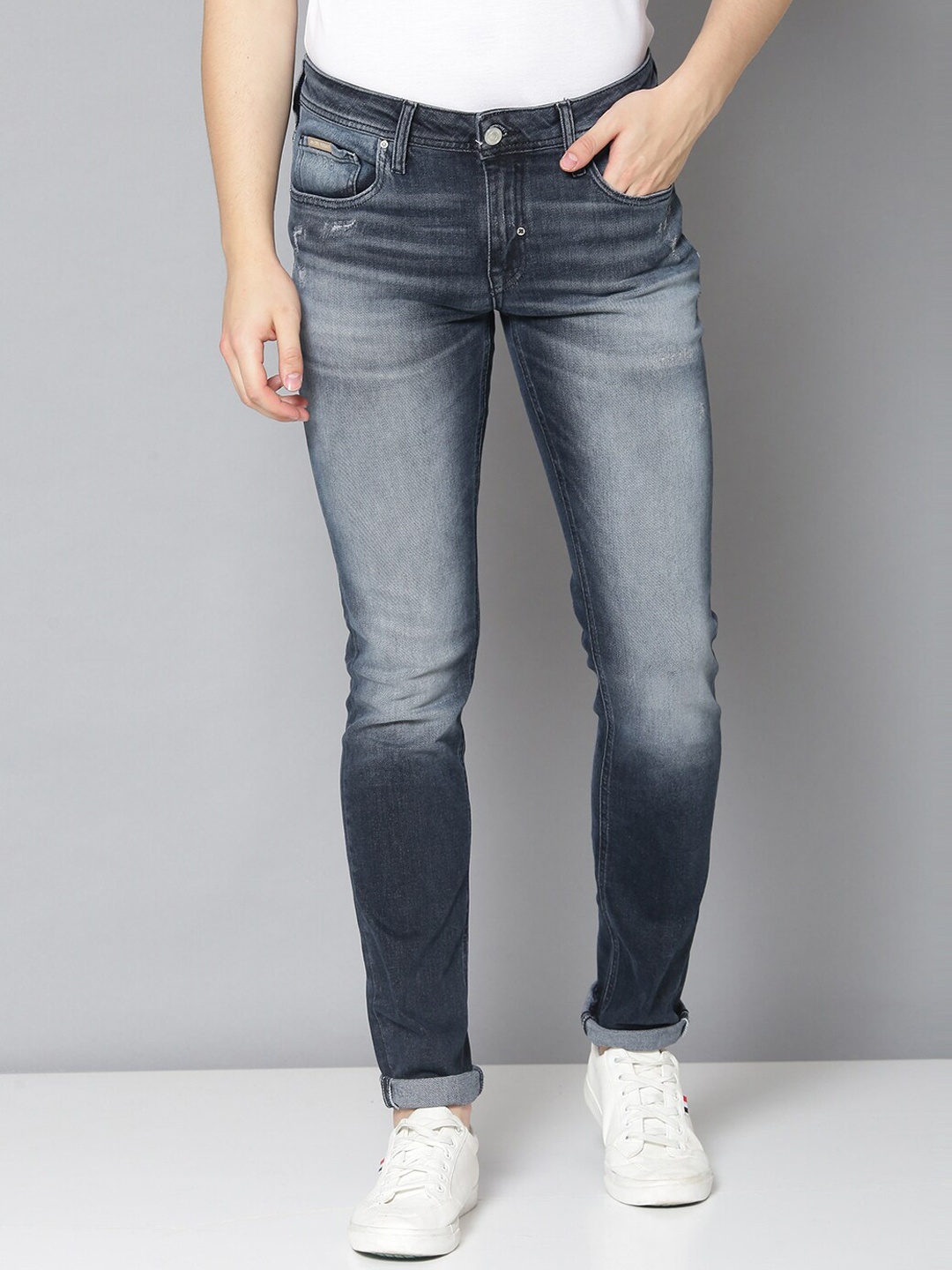 

Antony Morato Men Blue Tapered Fit Mid-Rise Low Distress Jeans