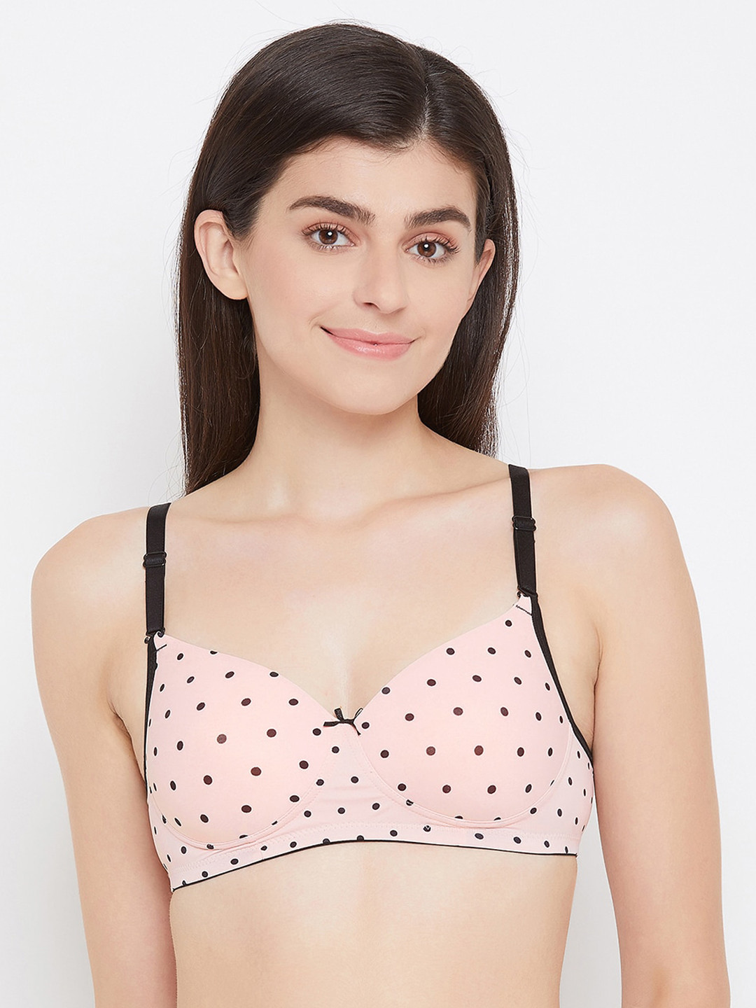 

Clovia Pink & Black Polka Dot Printed Non-Wired Lightly Padded T-shirt Bra BR1804G2236E