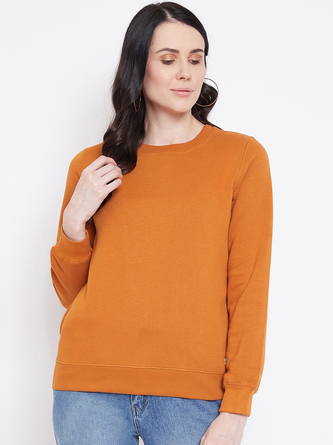 

Madame Women Brown Solid Sweatshirt
