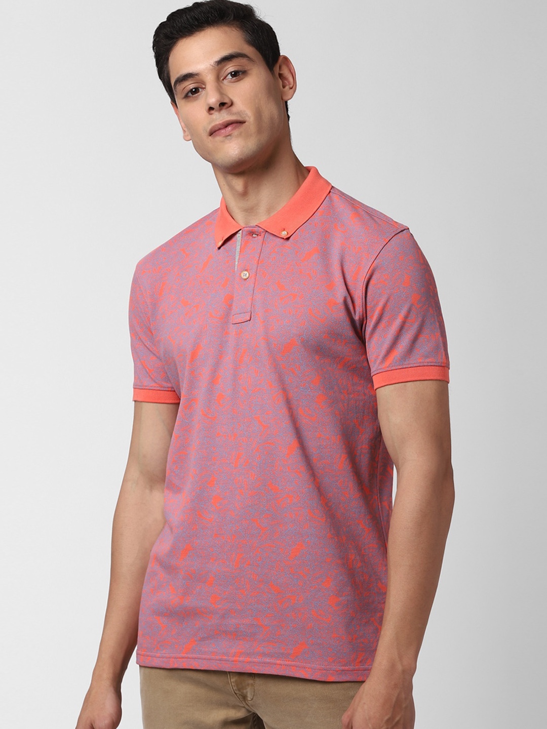 

Peter England Casuals Men Orange Printed Polo Collar Slim Fit T-shirt