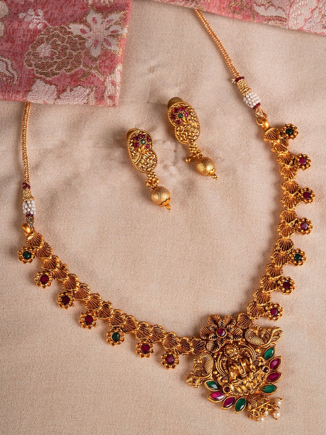 

Shoshaa Gold-Plated Red & Green Stone-Studded Handcrafted Temple Jewellery Set