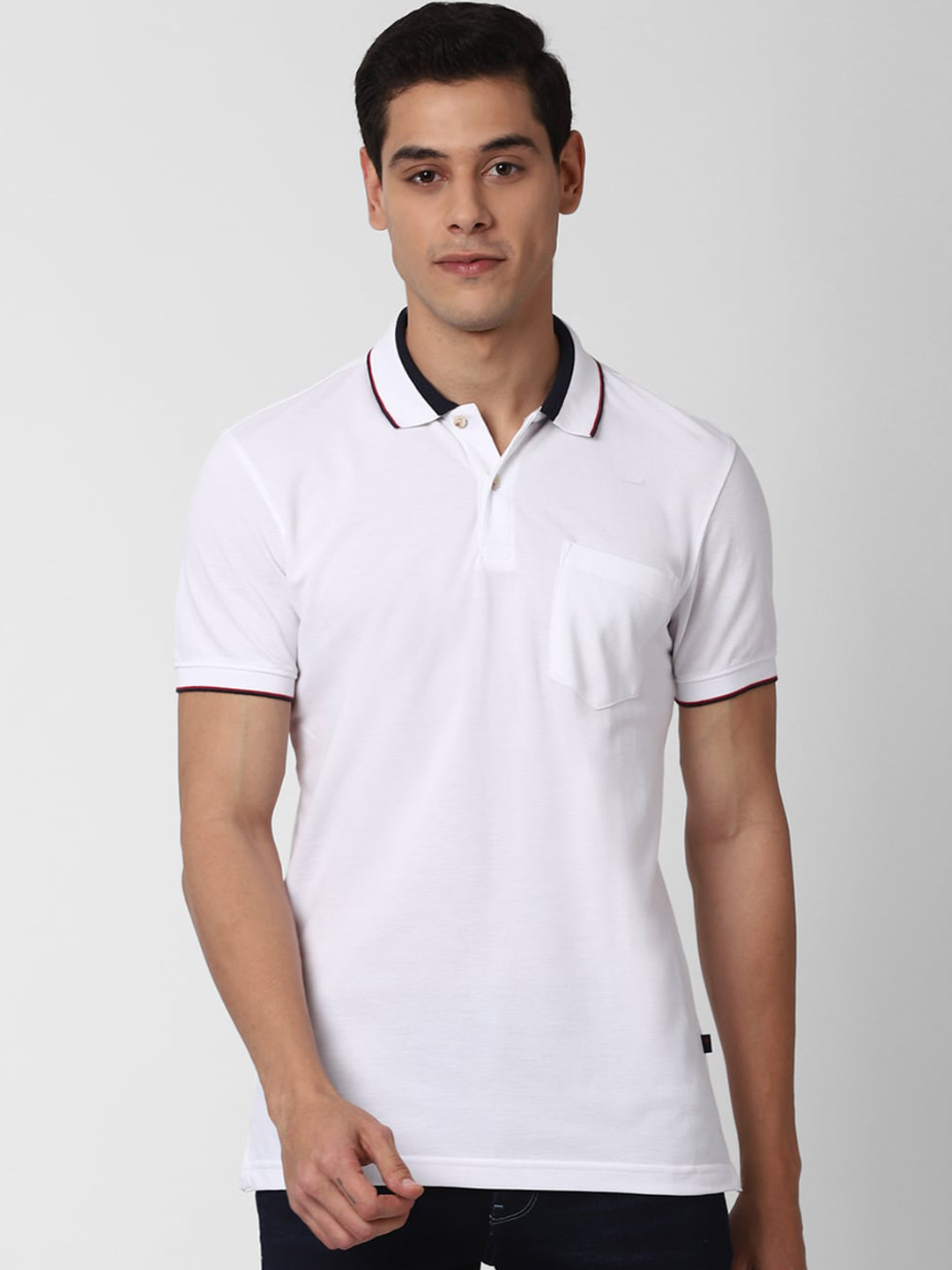 

Peter England Casuals Men White Solid Polo Collar T-shirt