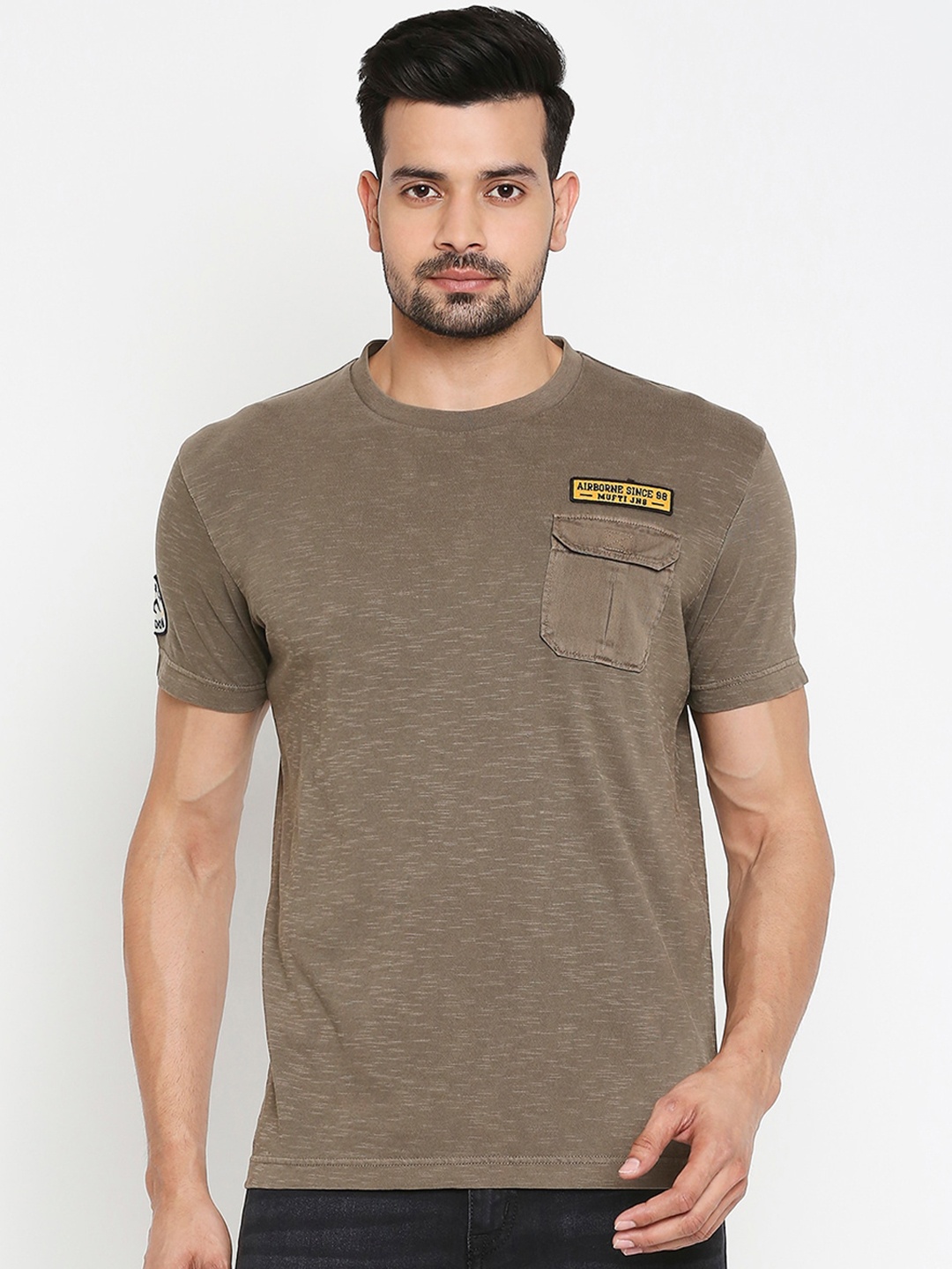 

Mufti Men Olive Green Solid Round Neck T-shirt