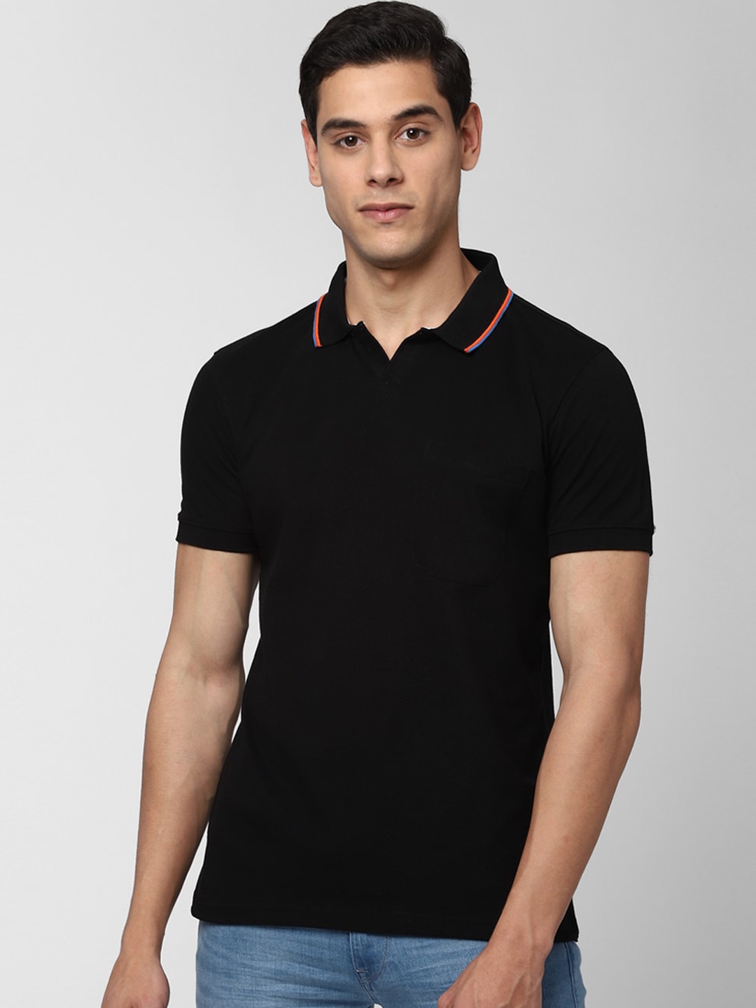 

Peter England Casuals Men Black Solid Polo Collar T-shirt
