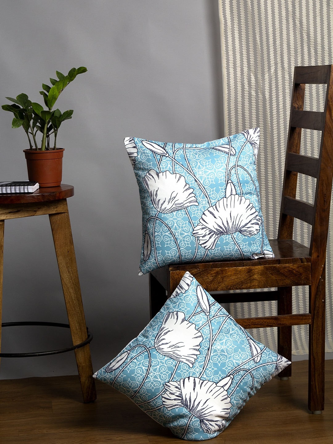 

Alina decor Blue & White Set of 2 Ethnic Motifs Square Cushion Covers