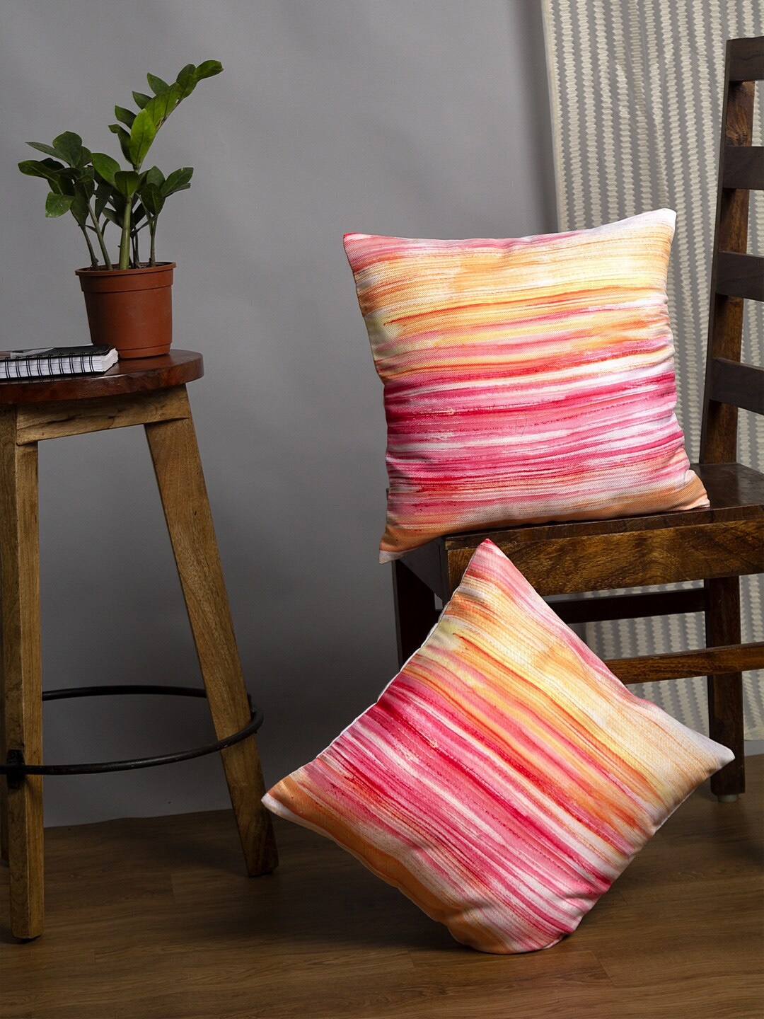 

Alina decor Set Of 2 Yellow & Pink Striped Square Cushion Covers