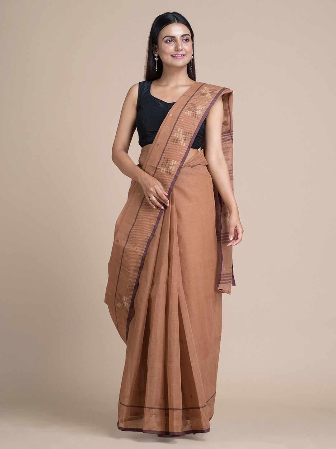 

Mitera Brown Pure Cotton Woven Design Taant Saree
