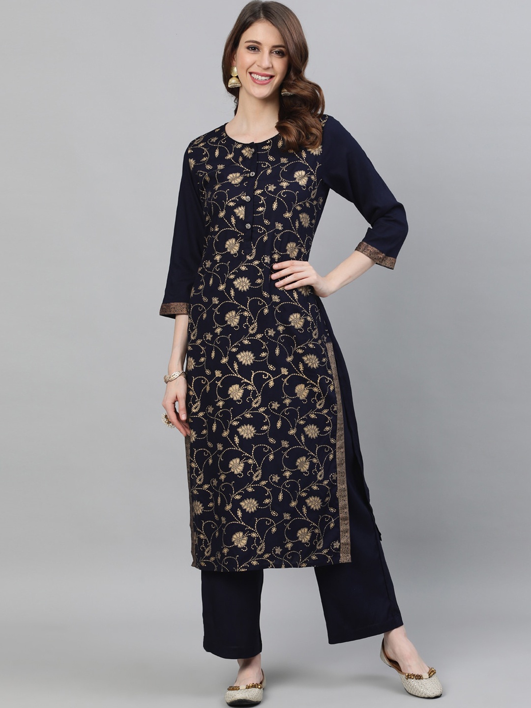 

Ishin Women Navy Blue & Golden Floral Foil Printed Kurta with Trousers