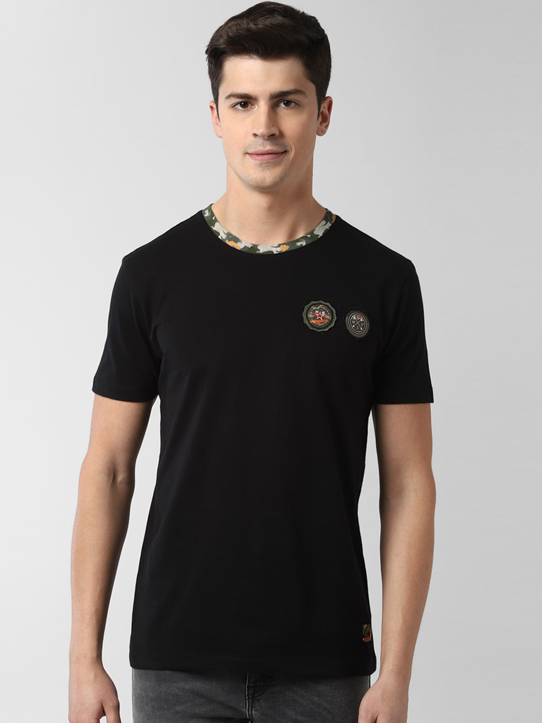 

Peter England Casuals Men Black Slim Fit Solid Round Neck T-shirt