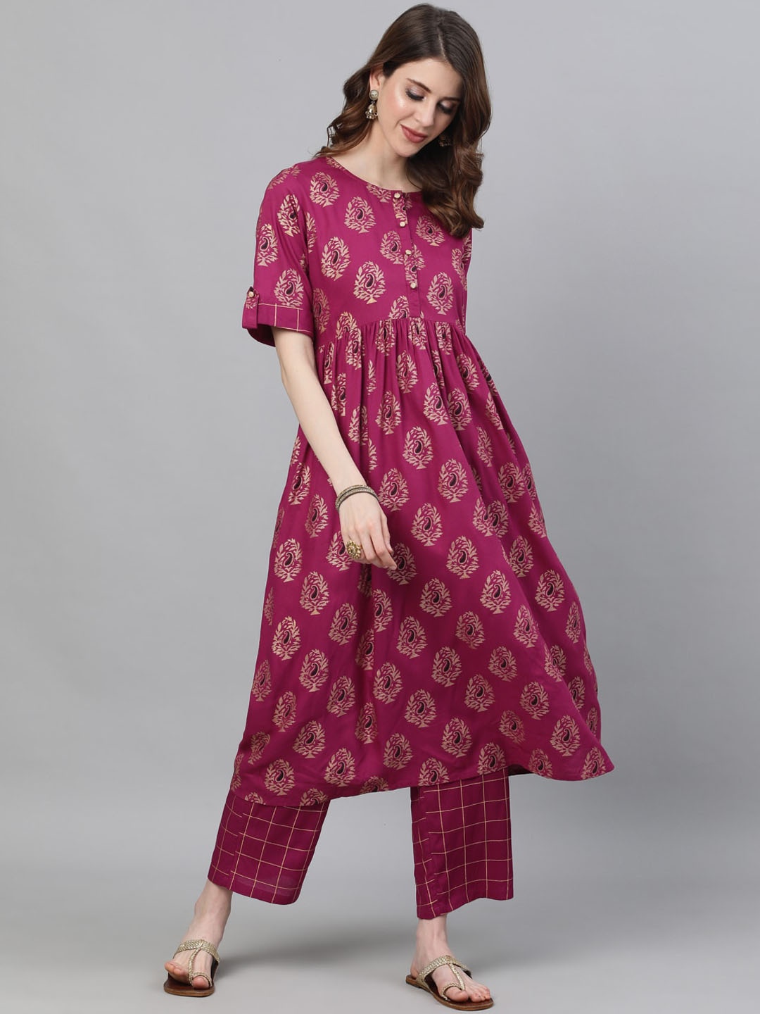 

Ishin Women Purple Ethnic Motifs Printed Empire Kurta with Palazzos
