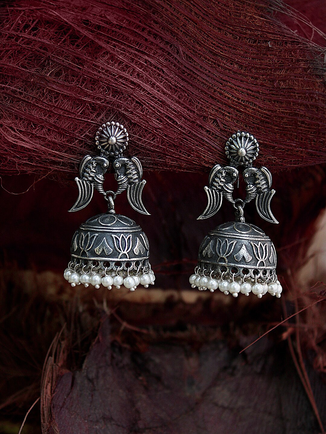

Adwitiya Collection Silver-Toned Dome Shaped Jhumkas
