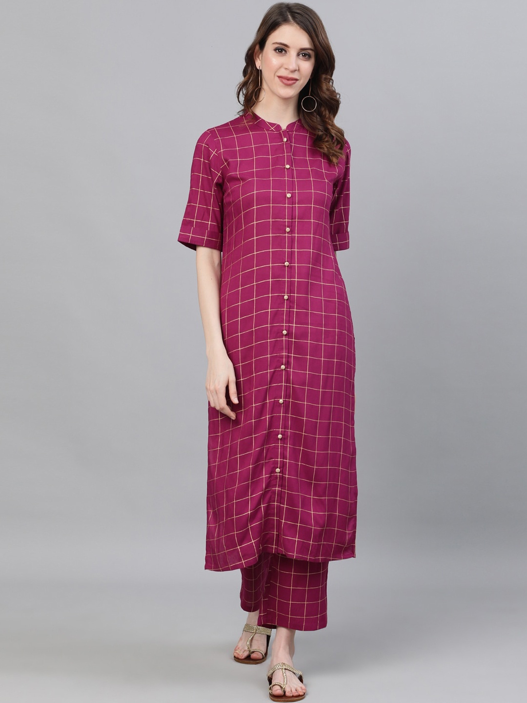 

Ishin Women Purple & Gold Kurta with Palazzos
