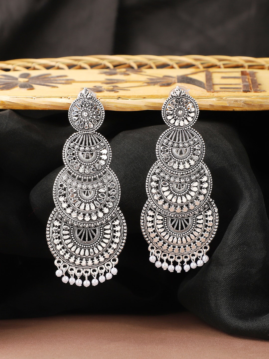 

ANIKAS CREATION Silver-Toned Contemporary Chandbalis
