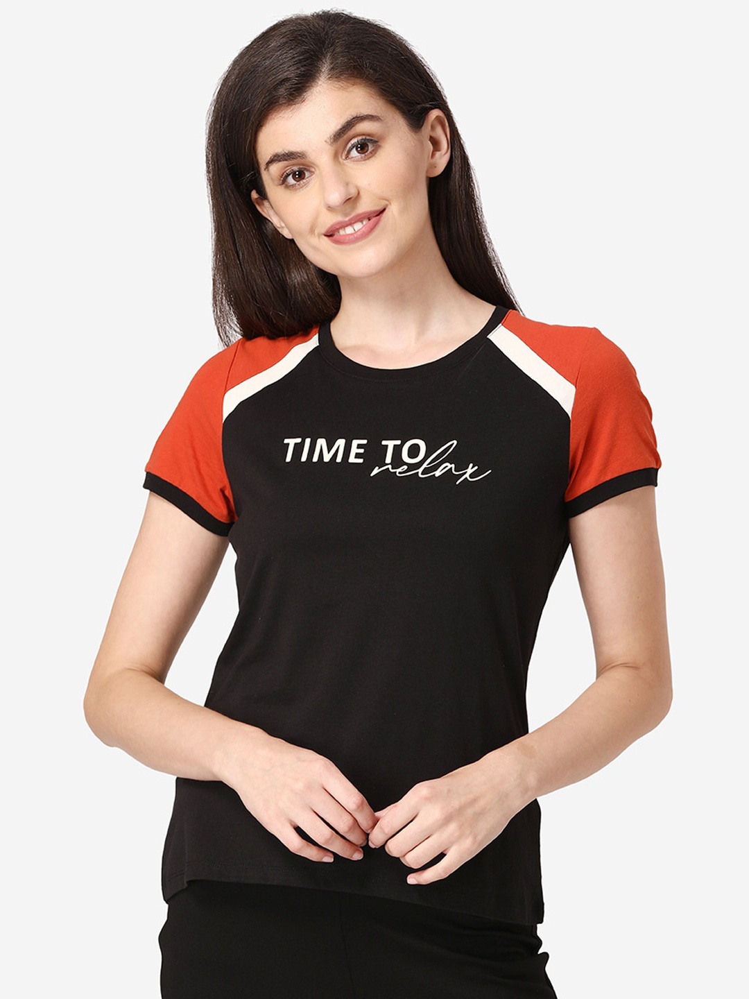 

Mode by Red Tape Women Black Solid Round Neck T-shirt
