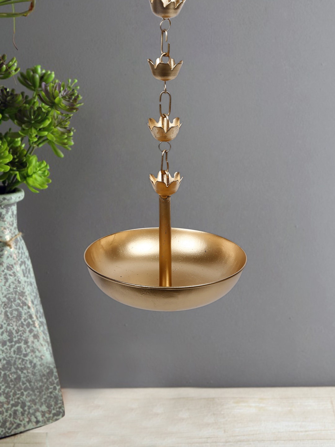 

CraftVatika Gold-Toned Hanging Urli Bowl Showpiece