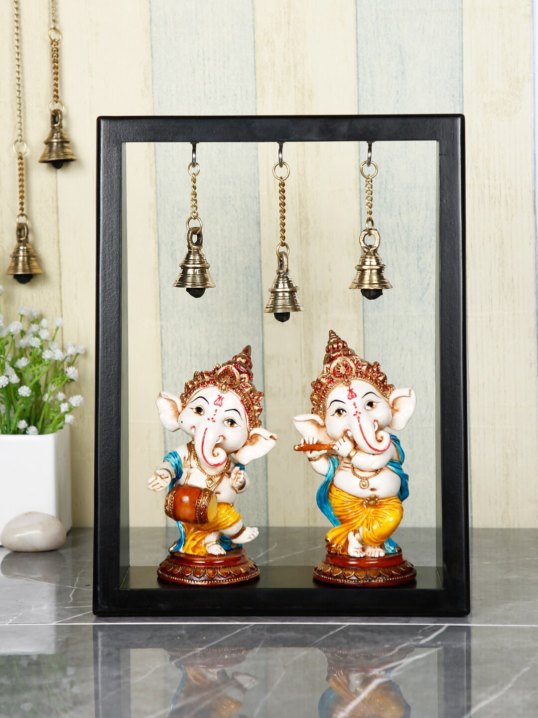 

CraftVatika White & Blue Dancing Ganesh Murti With Hanging Bells Showpiece