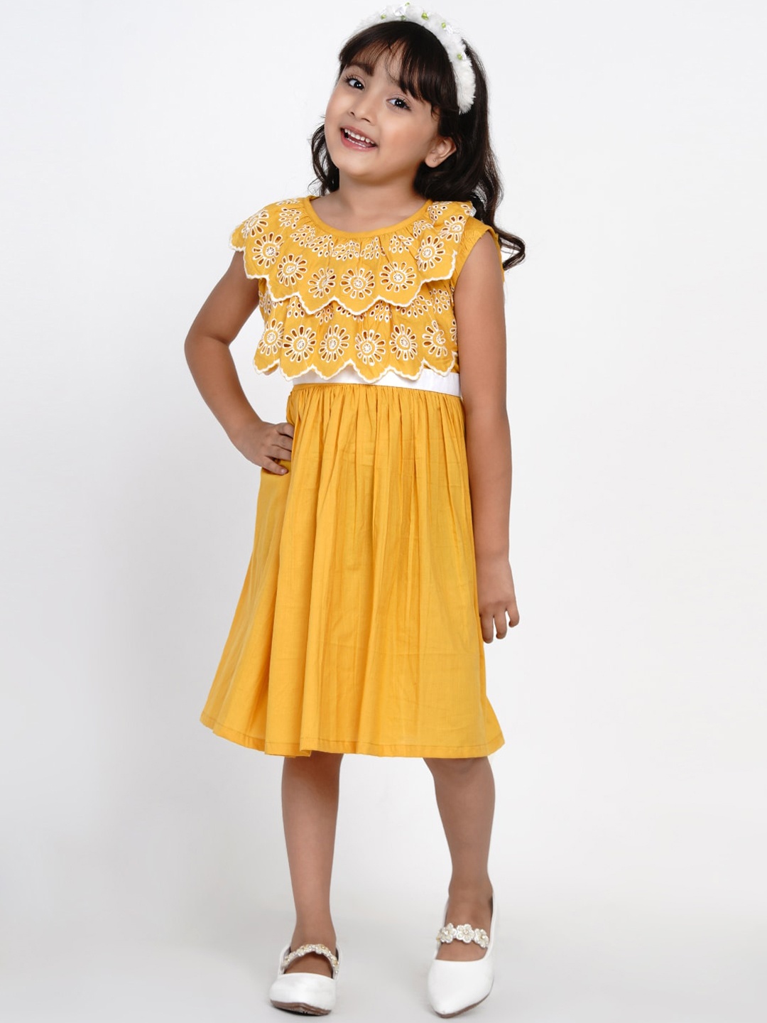 

Bitiya by Bhama Girls Mustard Yellow Self Design Schiffli Fit and Flare Dress