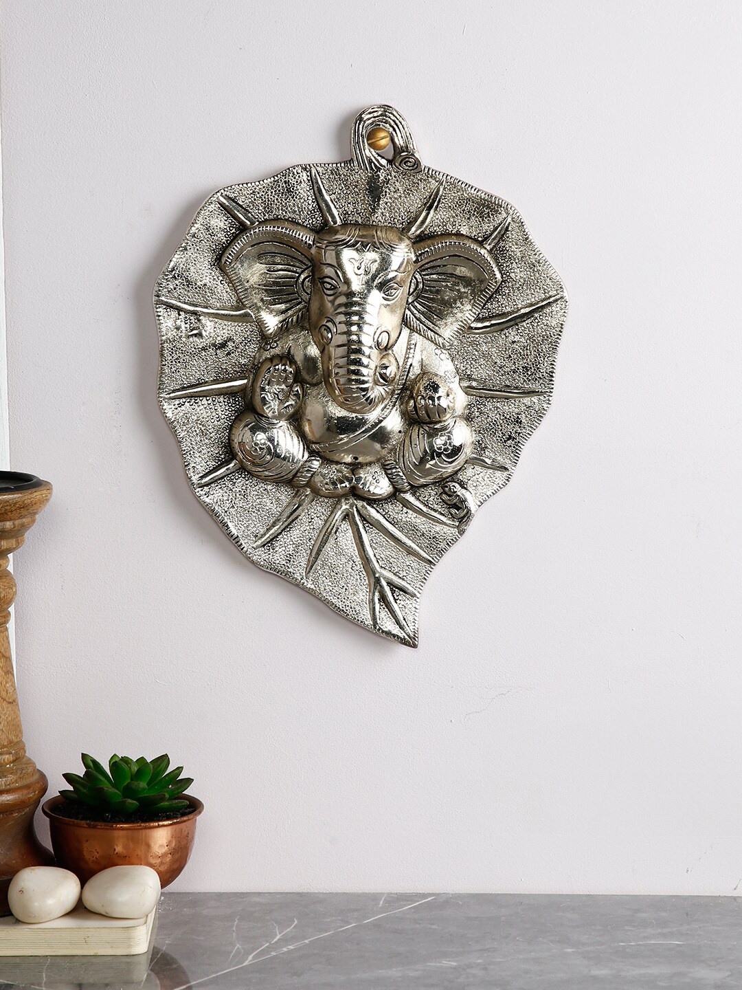 

CraftVatika Silver-Plated Ganesha Wall Hanging Plate on Leaf
