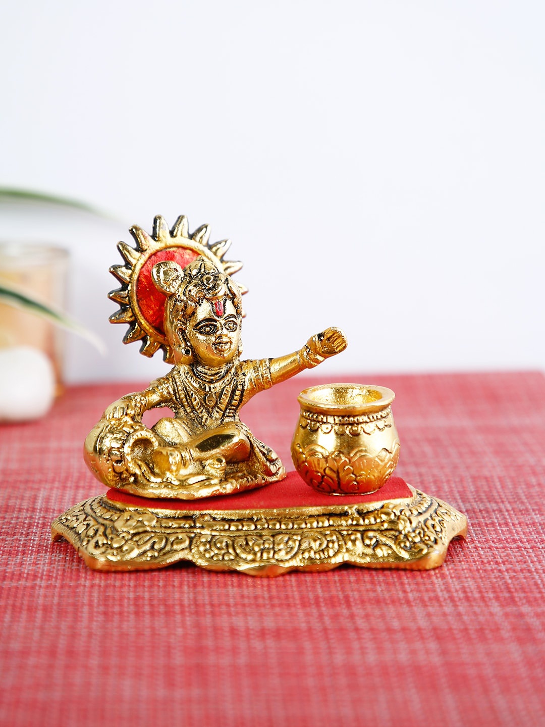 

CraftVatika Gold-Toned & Red Baby Krishna Idol Makhan Chor Showpiece