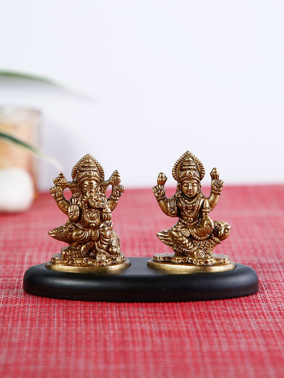 

CraftVatika Gold-Toned & Black Laxmi Ganesh Idol Handcrafted Showpiece