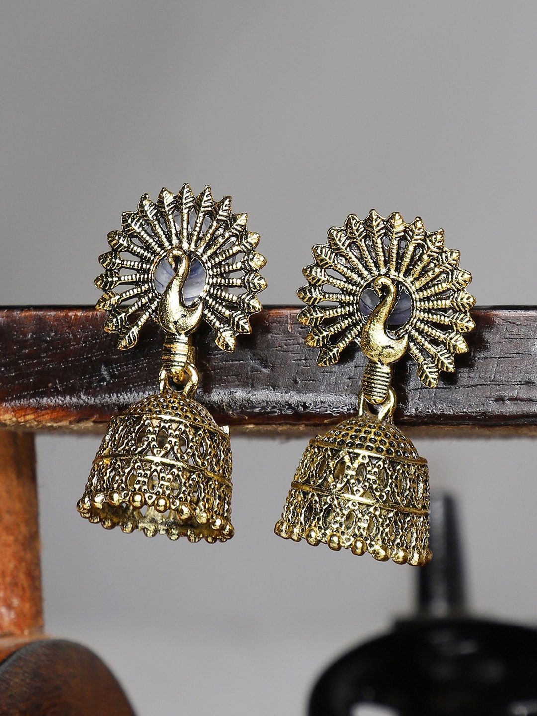 

ANIKAS CREATION Gold-Toned Traditional Antique Peacock Shaped Jhumkas