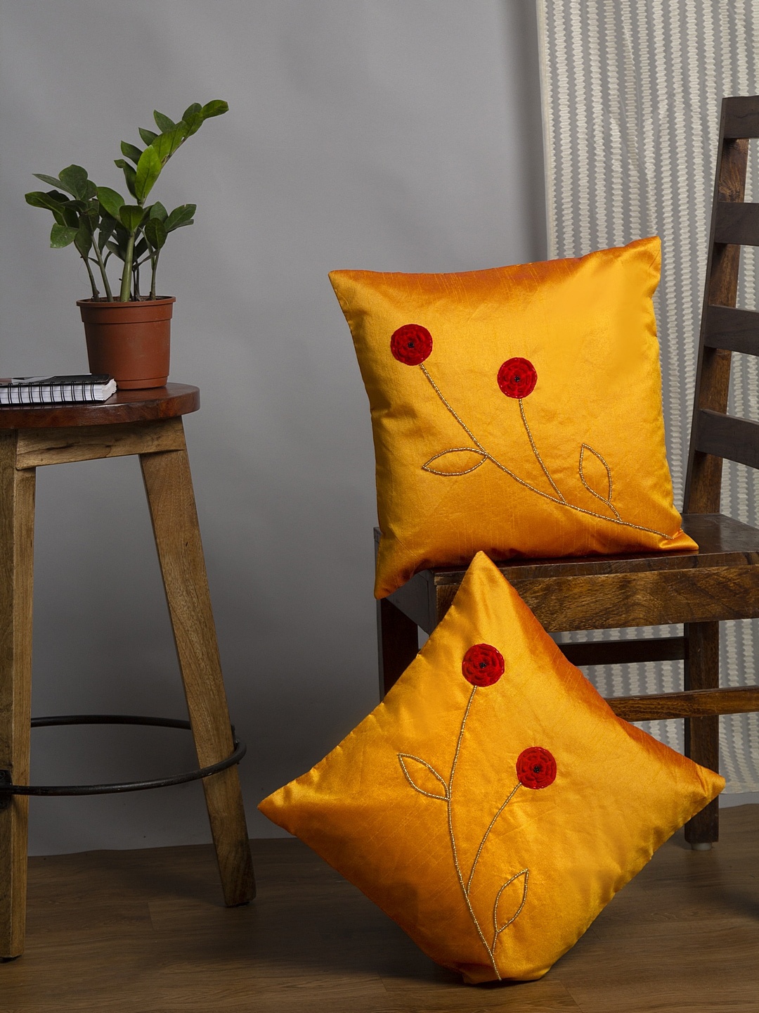 

Alina decor Set Of 2 Yellow & Red Embellished Square Cushion Covers